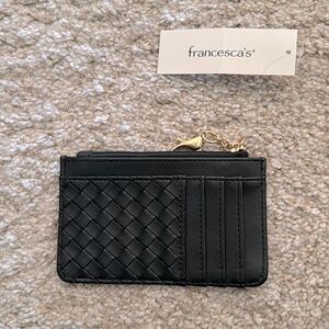Small black wallet. New with tags.